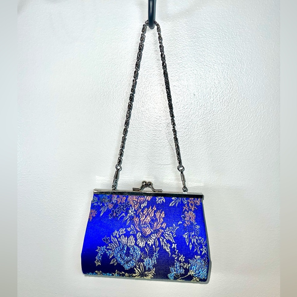 EUC Silk-Like Royal Blue floral clutch with small silver chain.